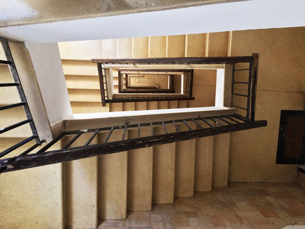 Staircases leading to the rooftop apartment in an apartment building in Central tel Aviv. Photo by Su Casa Tel Aviv Real Estate. All Rights Reserved.